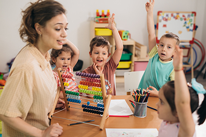 Teacher and children in classroom